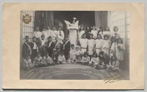 Untitled (Semi-Circle of Children, Central Girl Dressed as an Angel Holding the Baby Jesus)