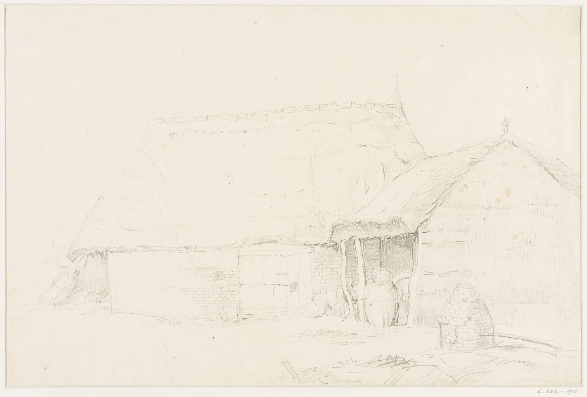 A thatched barn and shelter