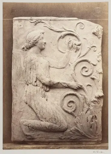 Bas-relief portion of a frieze of a female figure and foliage in terra cotta