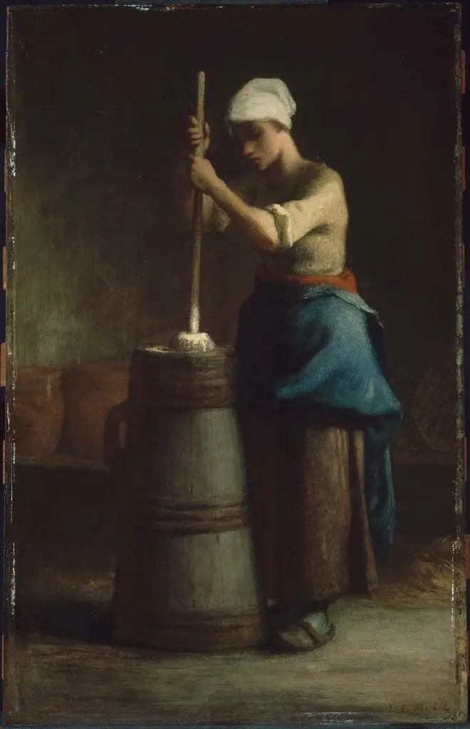 Young Woman Churning Butter