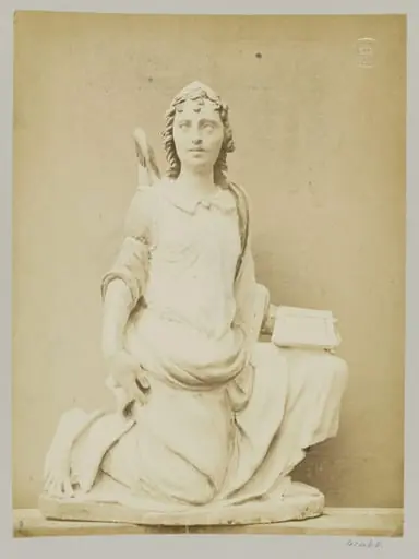 Figure of an Angel Kneeling, enamelled earthenware