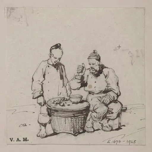 A Chinese man and boy beside a bowl placed on a basket