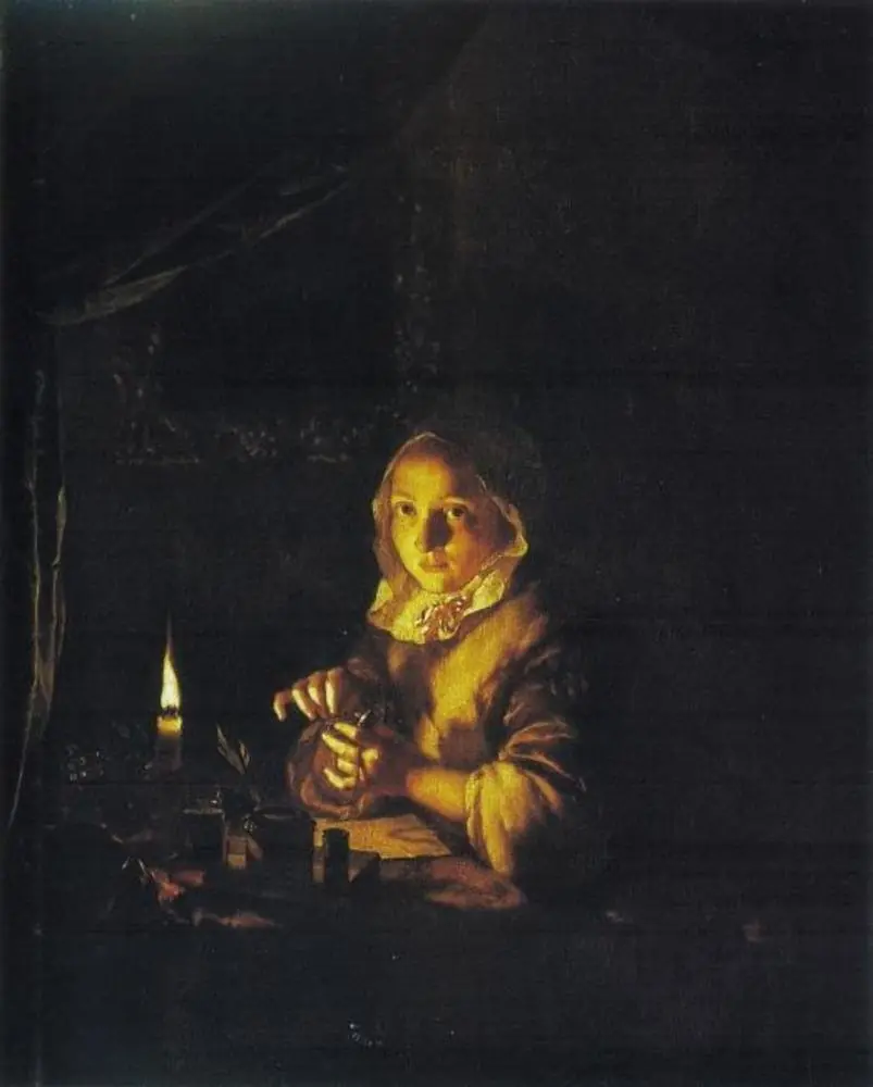 Young woman winding up a watch by candlelight