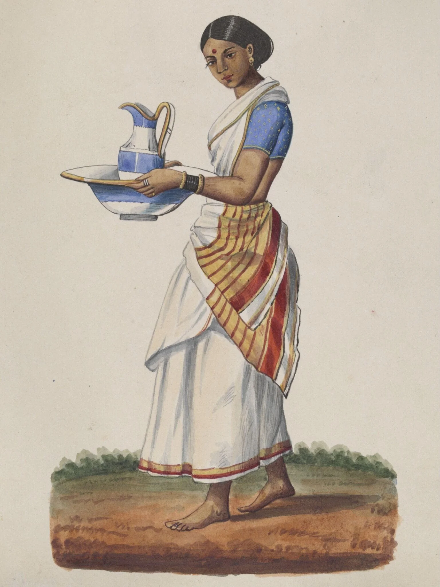 An ayah in a blue choli carrying a china ewer and basin