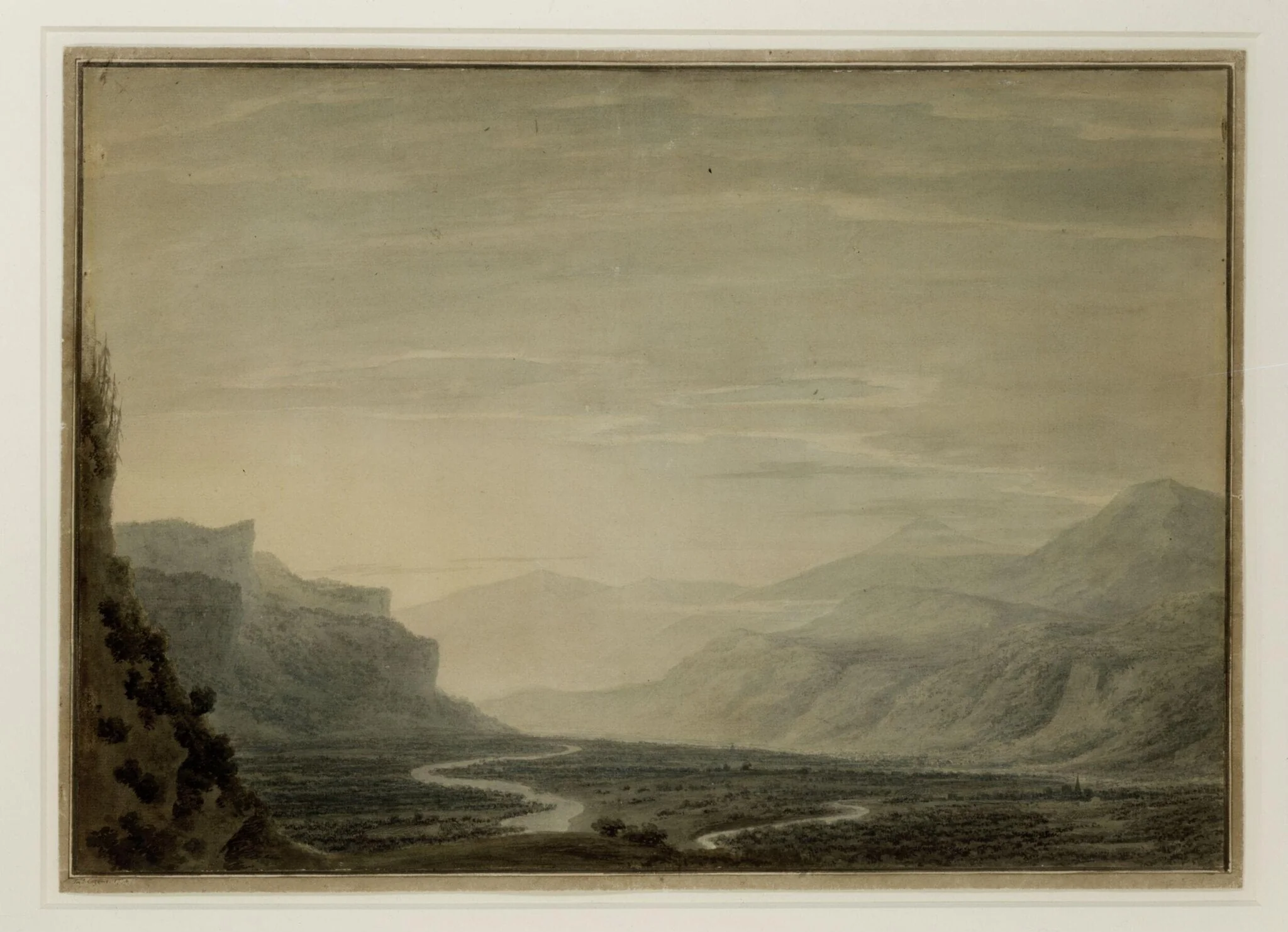 Valley with winding streams, a range of mountains in the background, and a village on the left