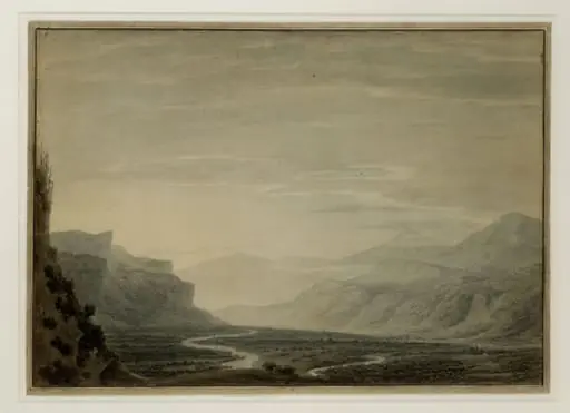 Valley with winding streams, a range of mountains in the background, and a village on the left